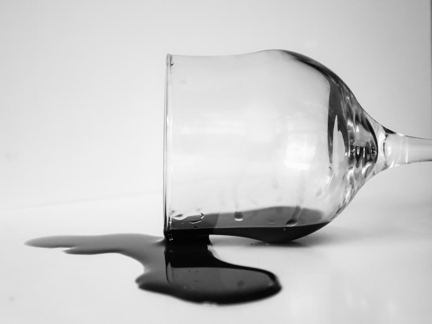 Spilled wine glass in black and white