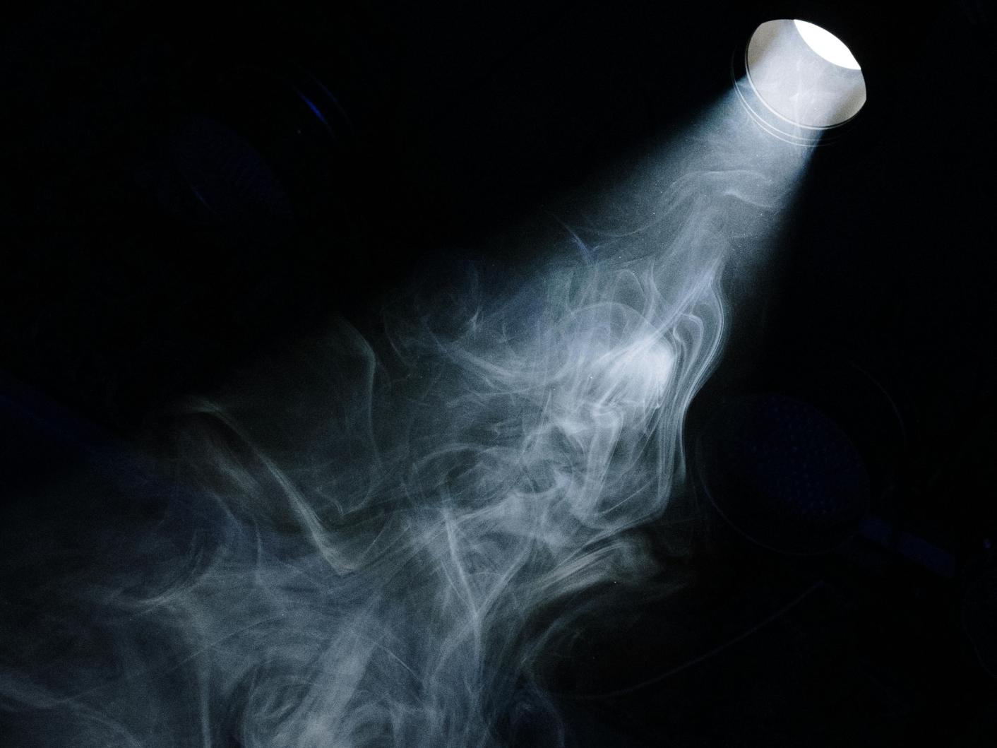 Spotlight illuminating smoke